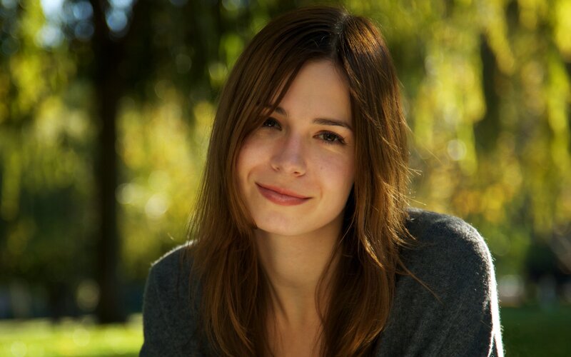 woman smiling in park