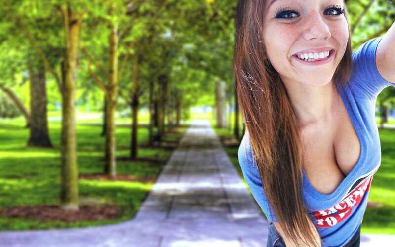 woman smiling in park