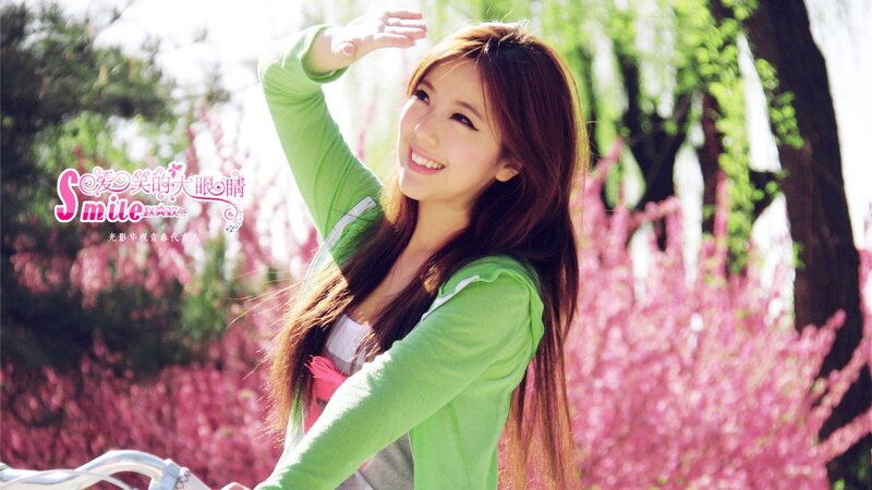 woman smiling in park