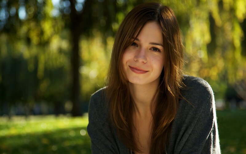 woman smiling in park