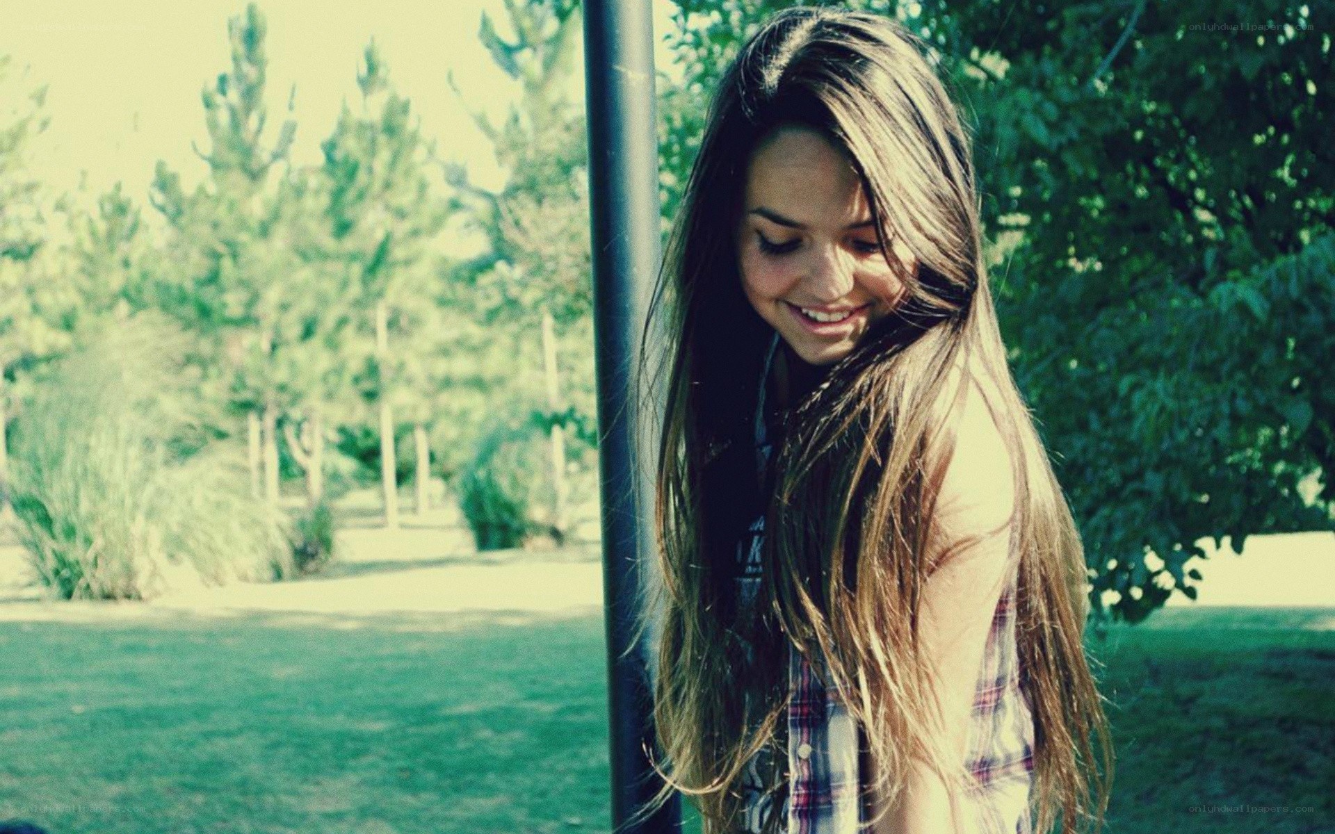 woman smiling in park