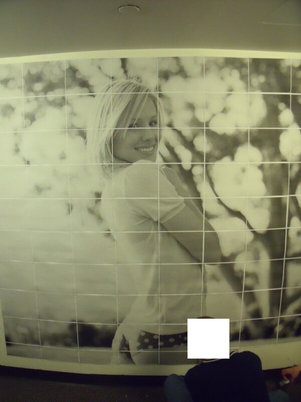 woman smiling in photo mural