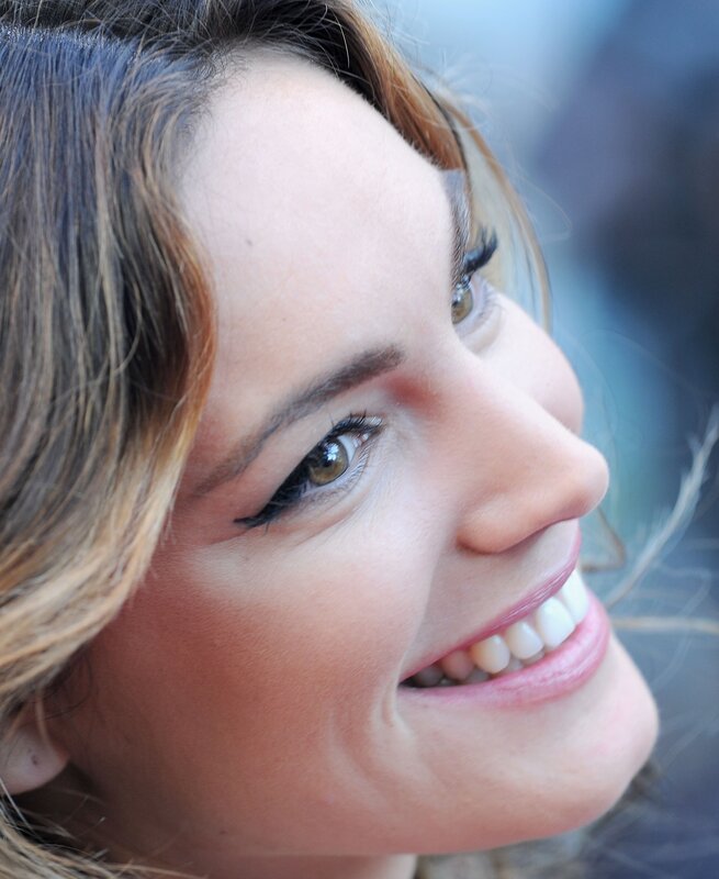 woman smiling in profile