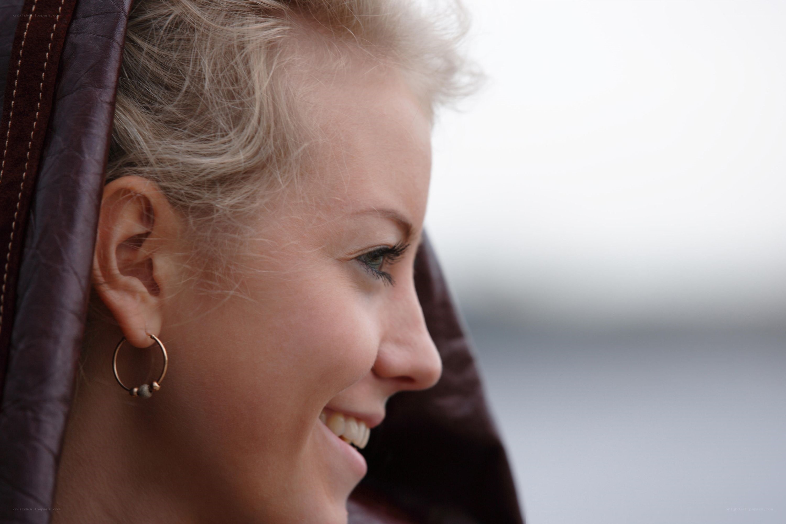 woman smiling in profile