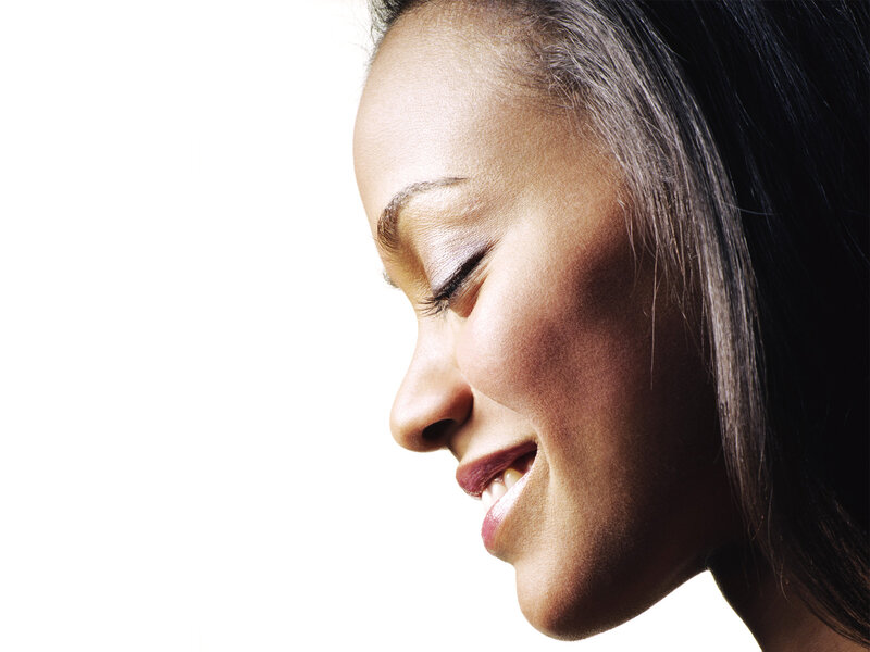 woman smiling in profile