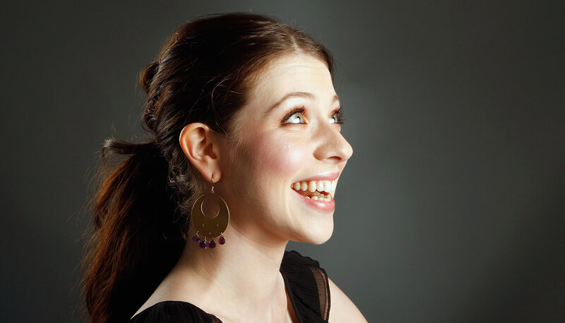 woman smiling in profile