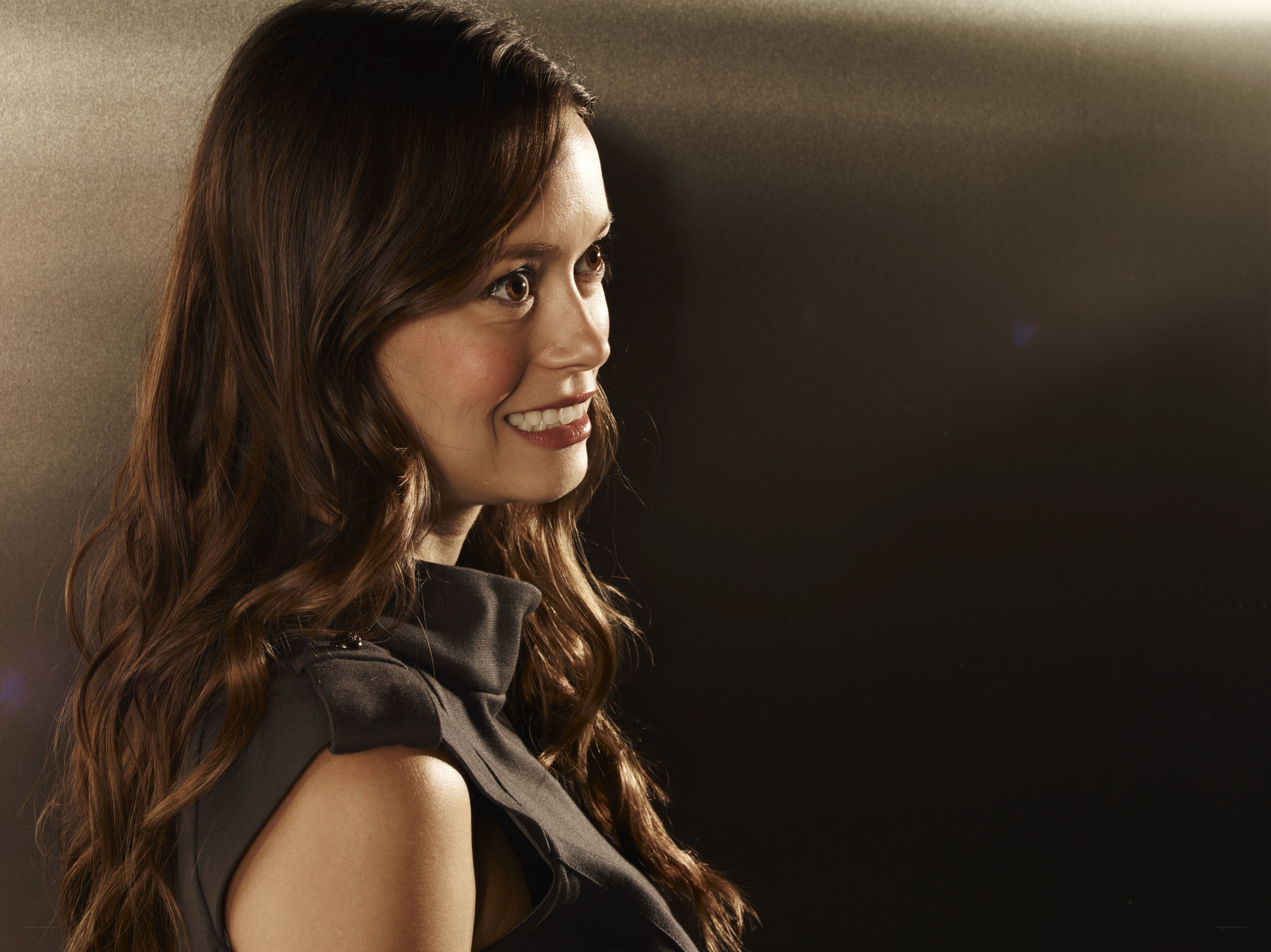 woman smiling in profile