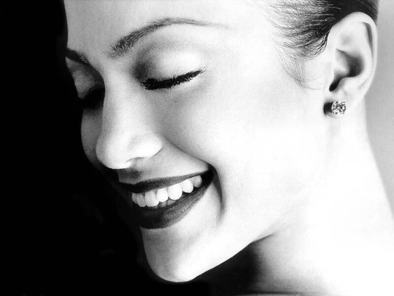 Woman Smiling in Profile — Black