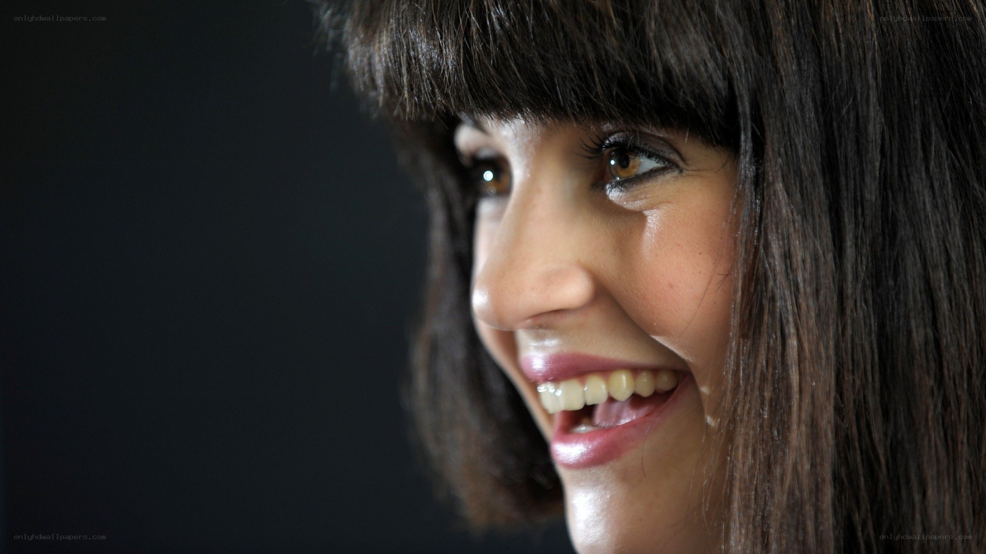 woman smiling in profile
