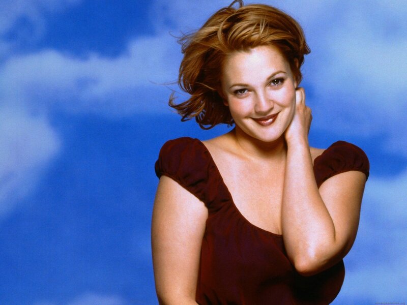 woman smiling in red dress