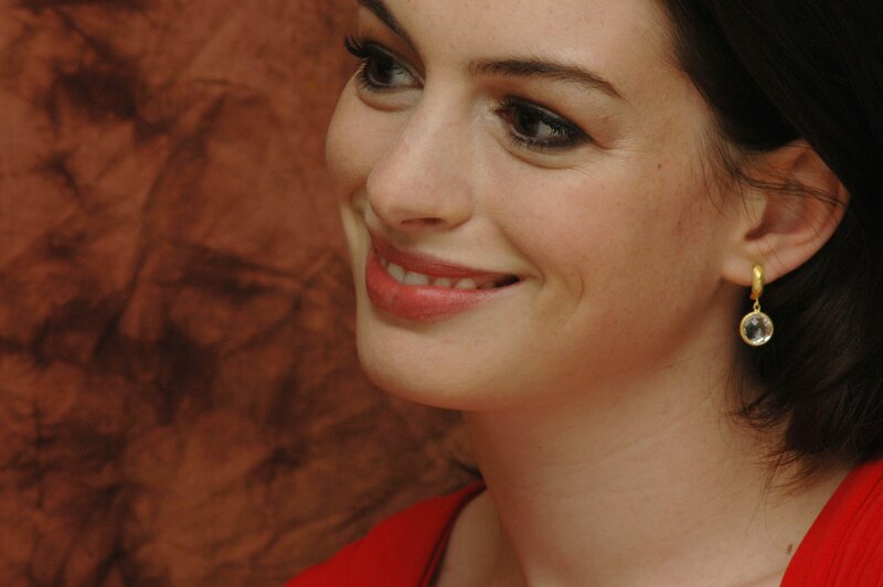 woman smiling in red dress