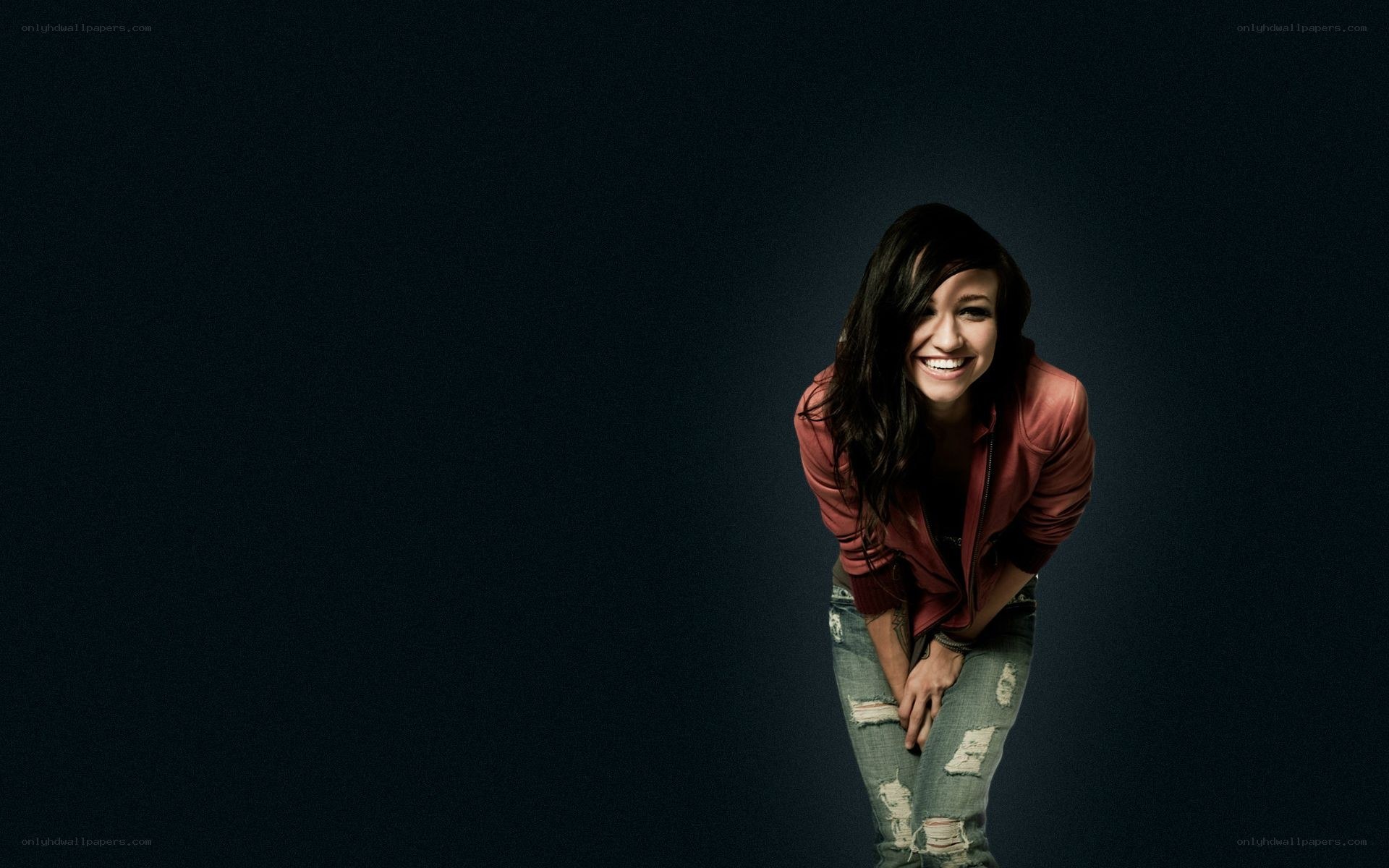 woman smiling in red jacket