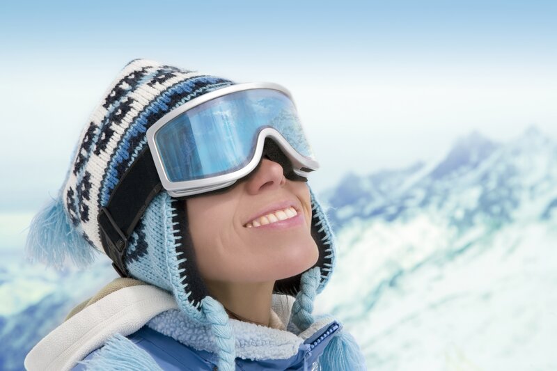 woman smiling in ski gear