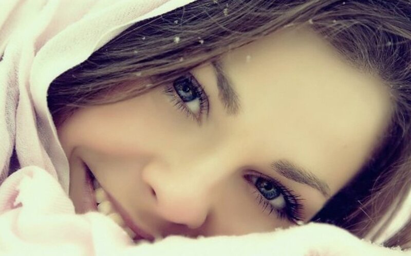 woman smiling in snow