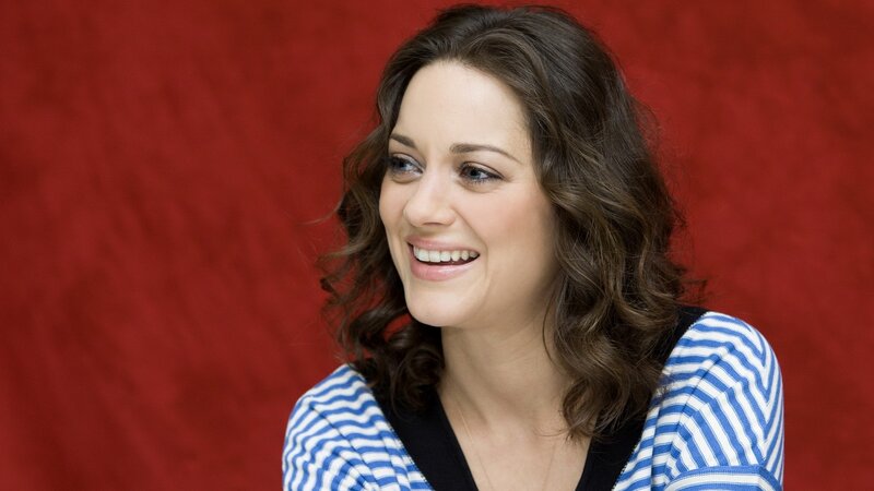 woman smiling in striped shirt