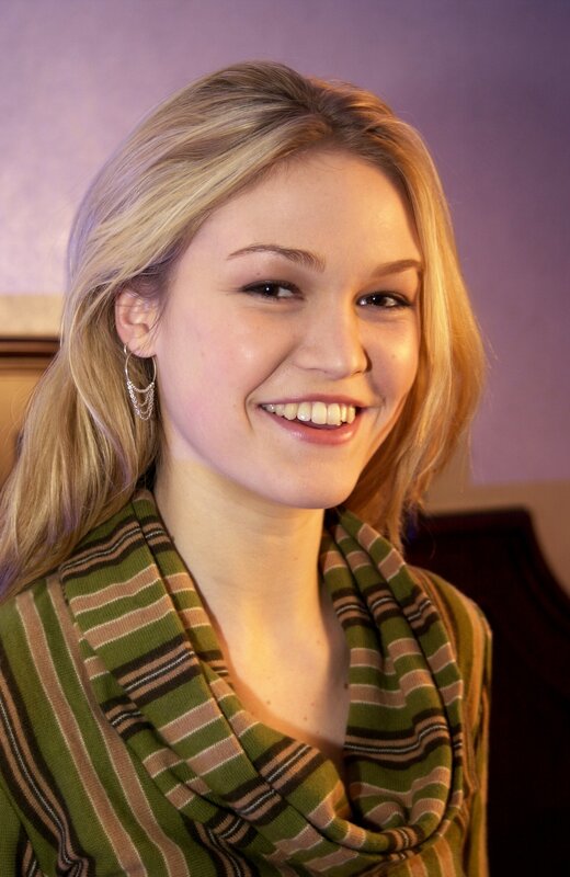 woman smiling in striped sweater