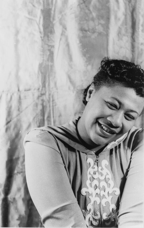 woman smiling in studio portrait