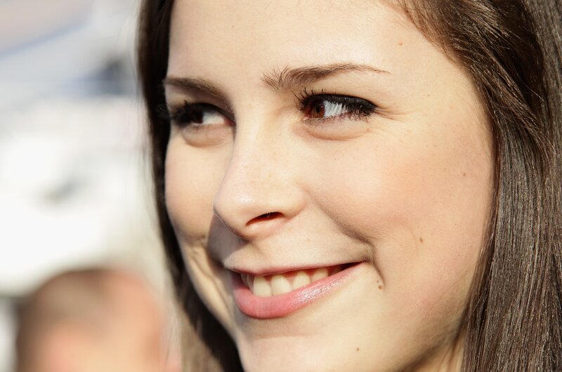 woman smiling in sunlight