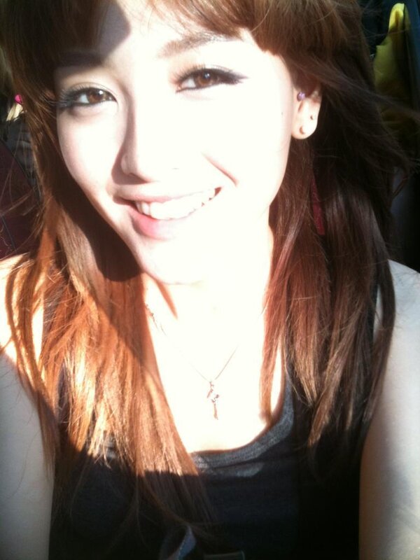 woman smiling in sunlight