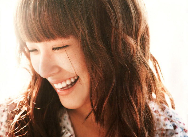woman smiling in sunlight