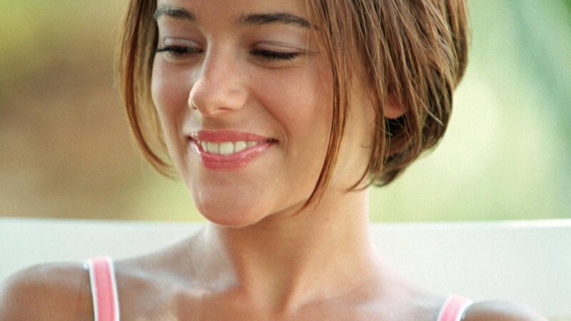 woman smiling in sunlight