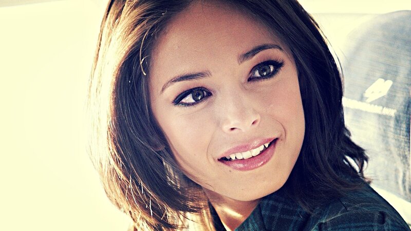 woman smiling in sunlight