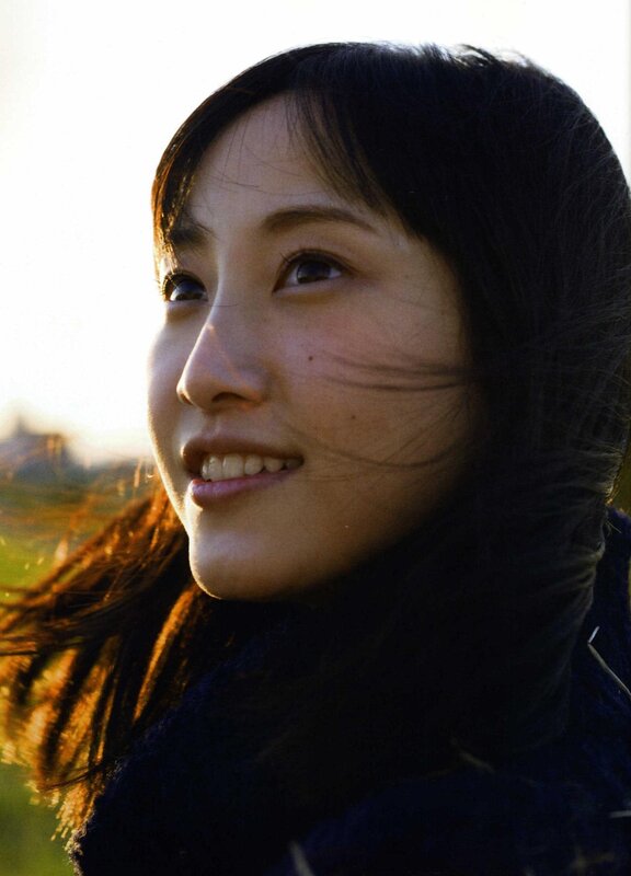 woman smiling in sunlight