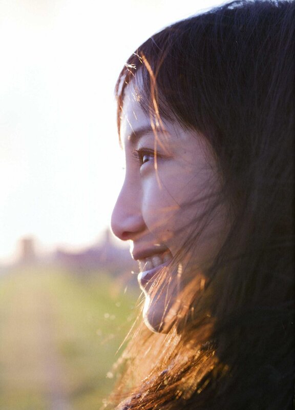 woman smiling in sunlight