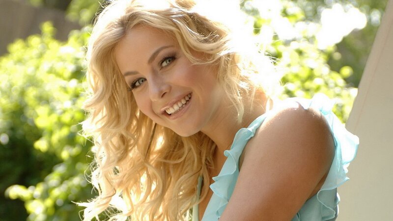 woman smiling in sunlight