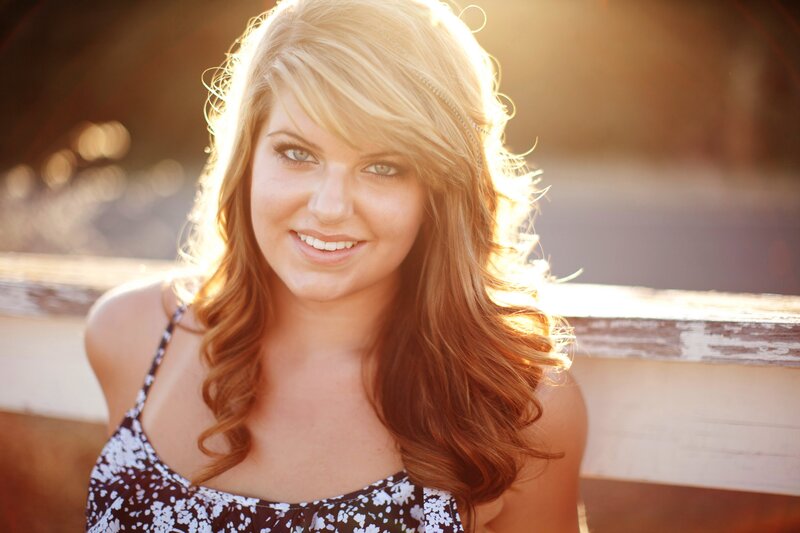 woman smiling in sunlight