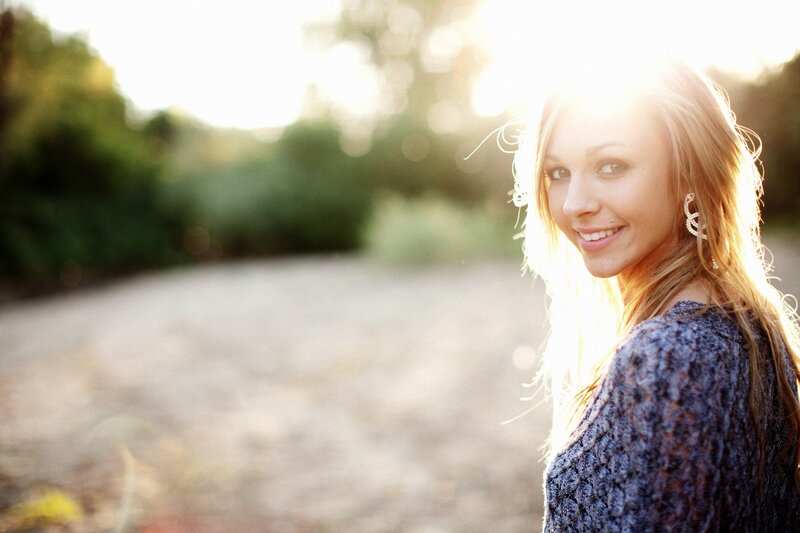 woman smiling in sunlight