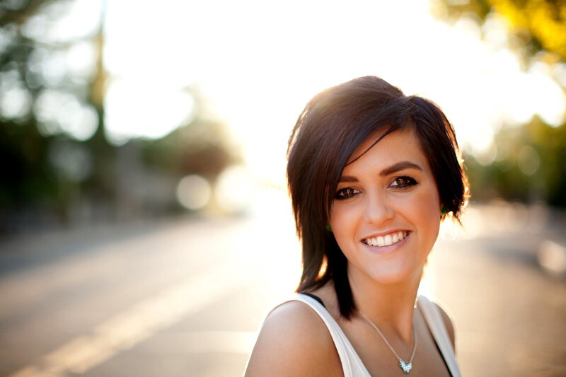 woman smiling in sunlight