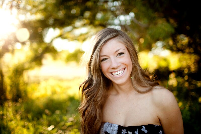 woman smiling in sunlight