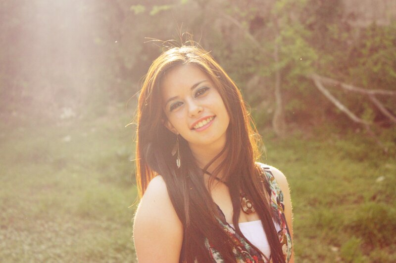woman smiling in sunlight
