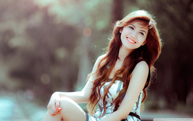 woman smiling in sunlight