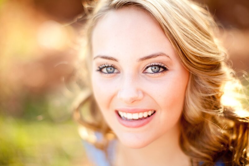 woman smiling in sunlight