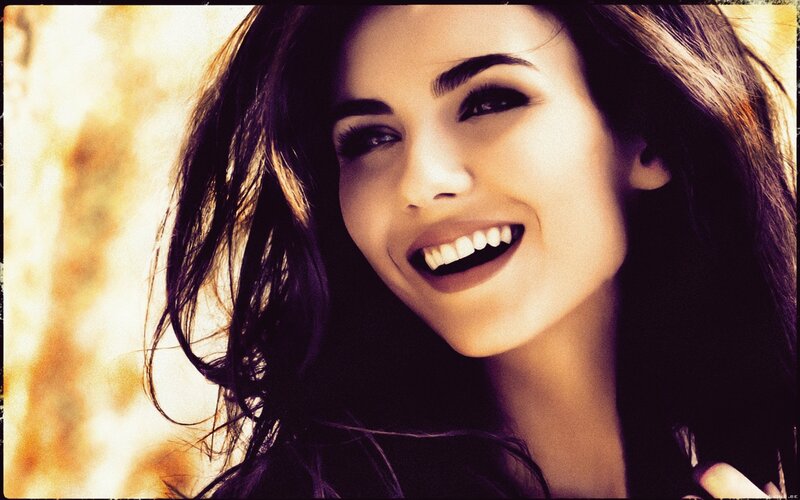 woman smiling in sunlight