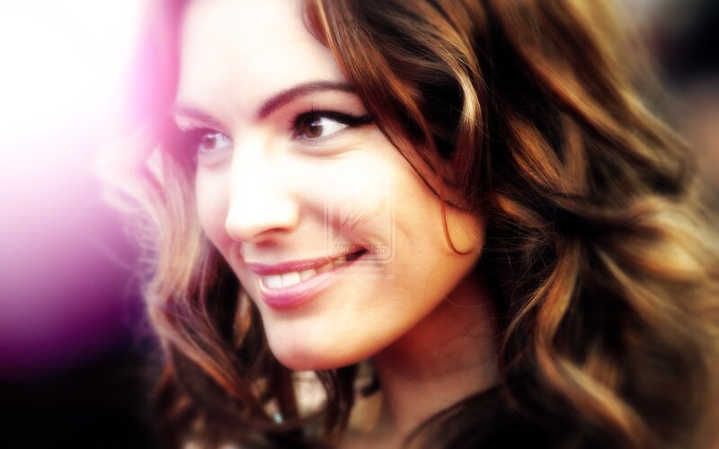 woman smiling in sunlight
