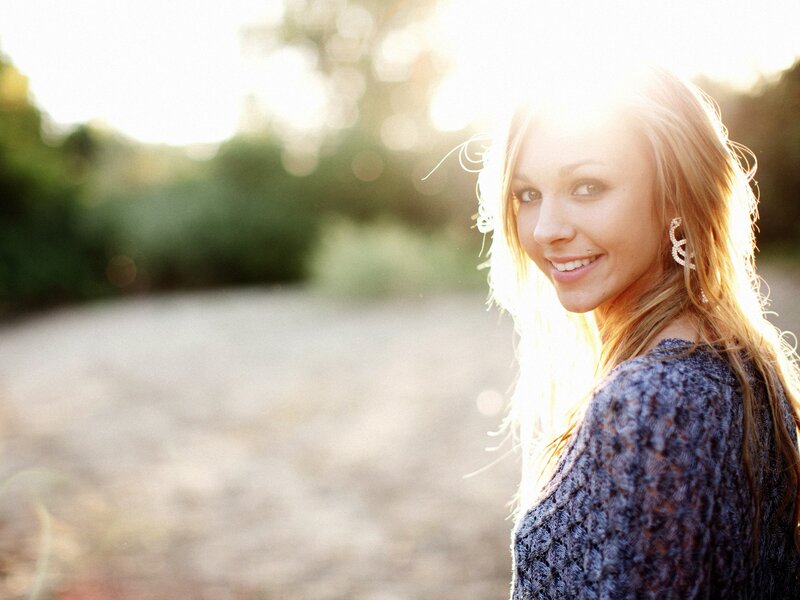 woman smiling in sunlight