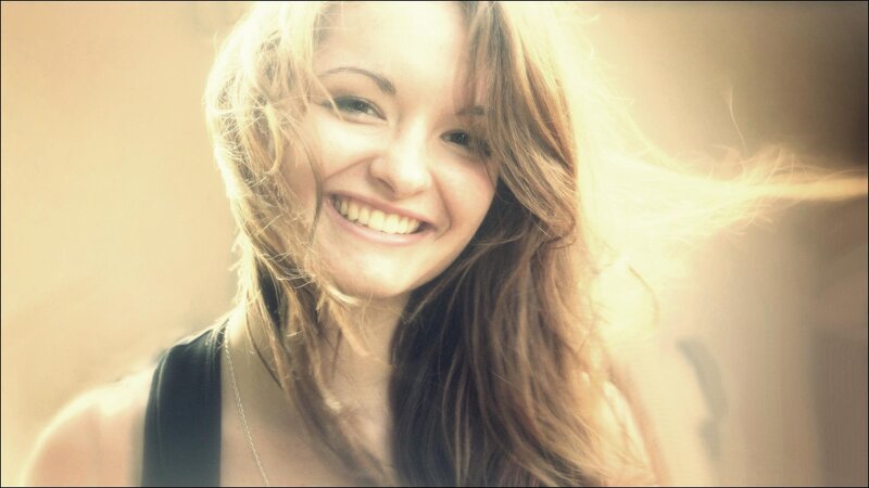 woman smiling in sunlight