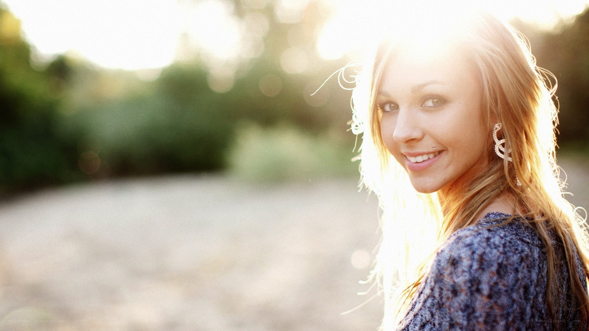 woman smiling in sunlight