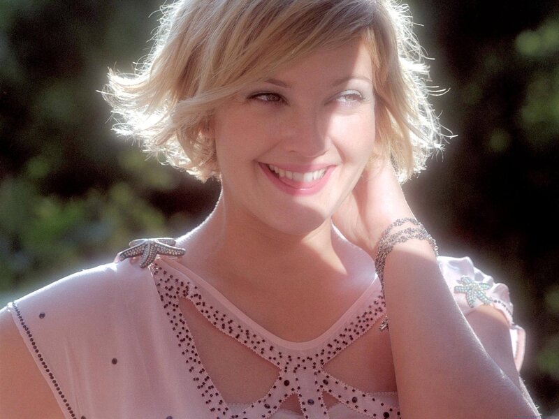 woman smiling in sunlight