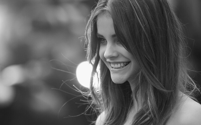 woman smiling in sunlight