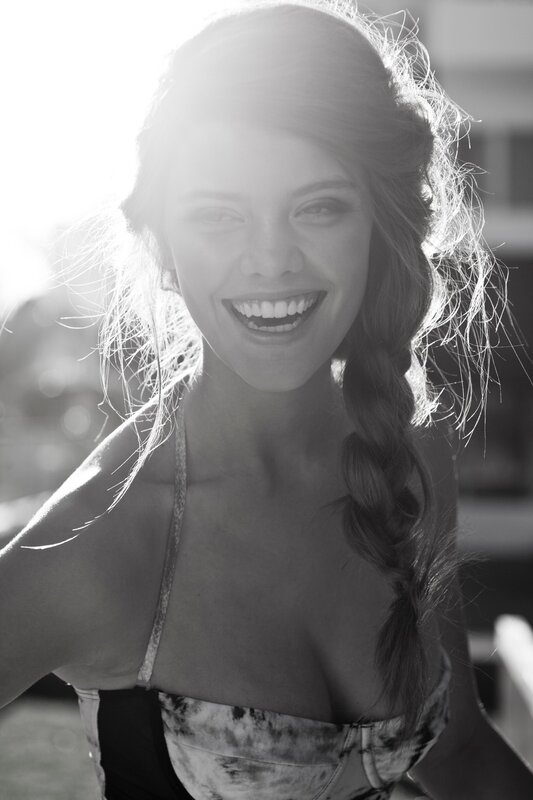 woman smiling in sunlight