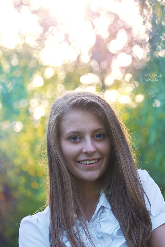 woman smiling in sunlight