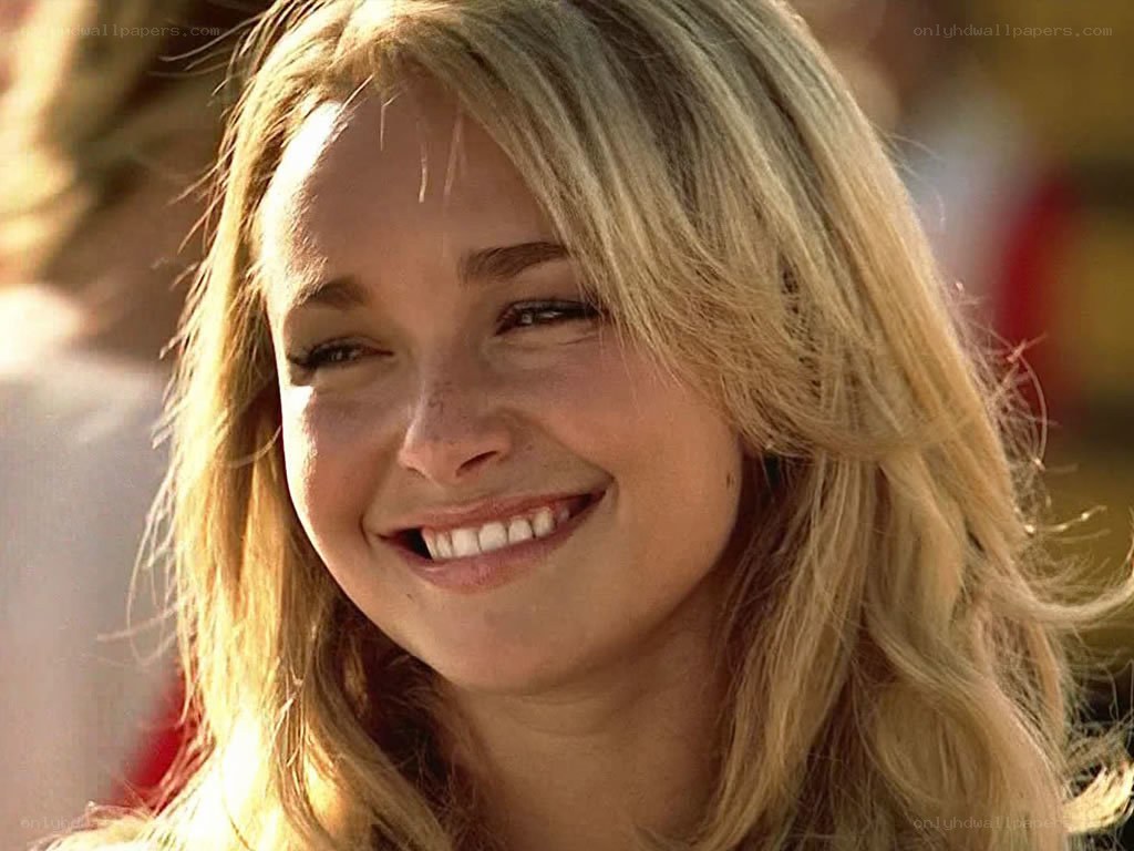 woman smiling in sunlight