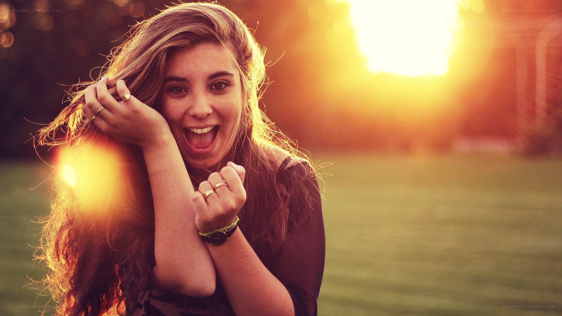 woman smiling in sunset