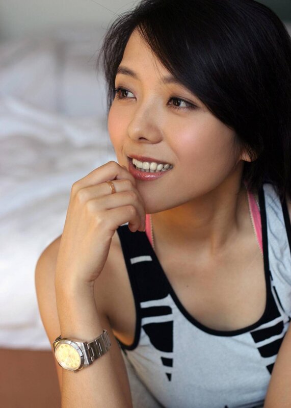 woman smiling in tank top