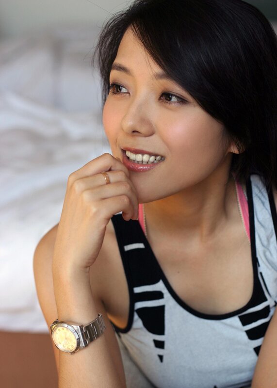 woman smiling in tank top