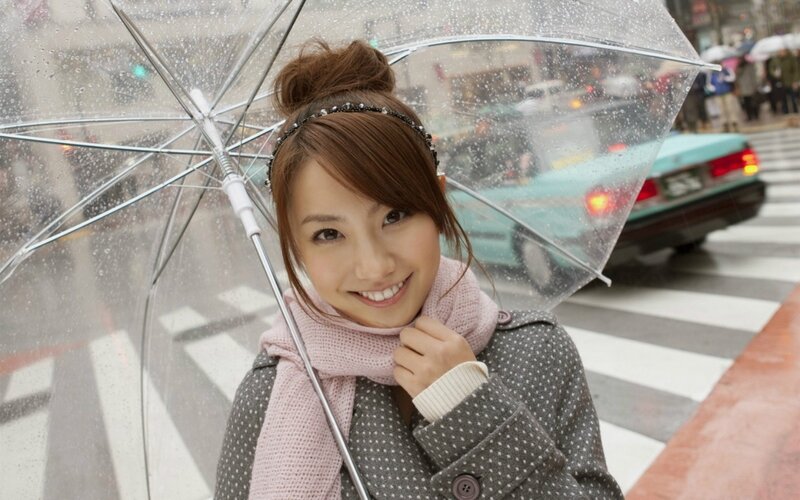 Woman smiling in the rain
